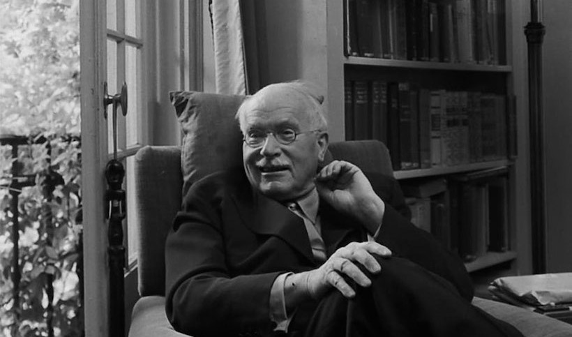 Dr.-Carl-Jung-relaxing-in-an-easy-chair-in-his-library-at-home-in-Knusnacht-Switzerland-1949-820x483